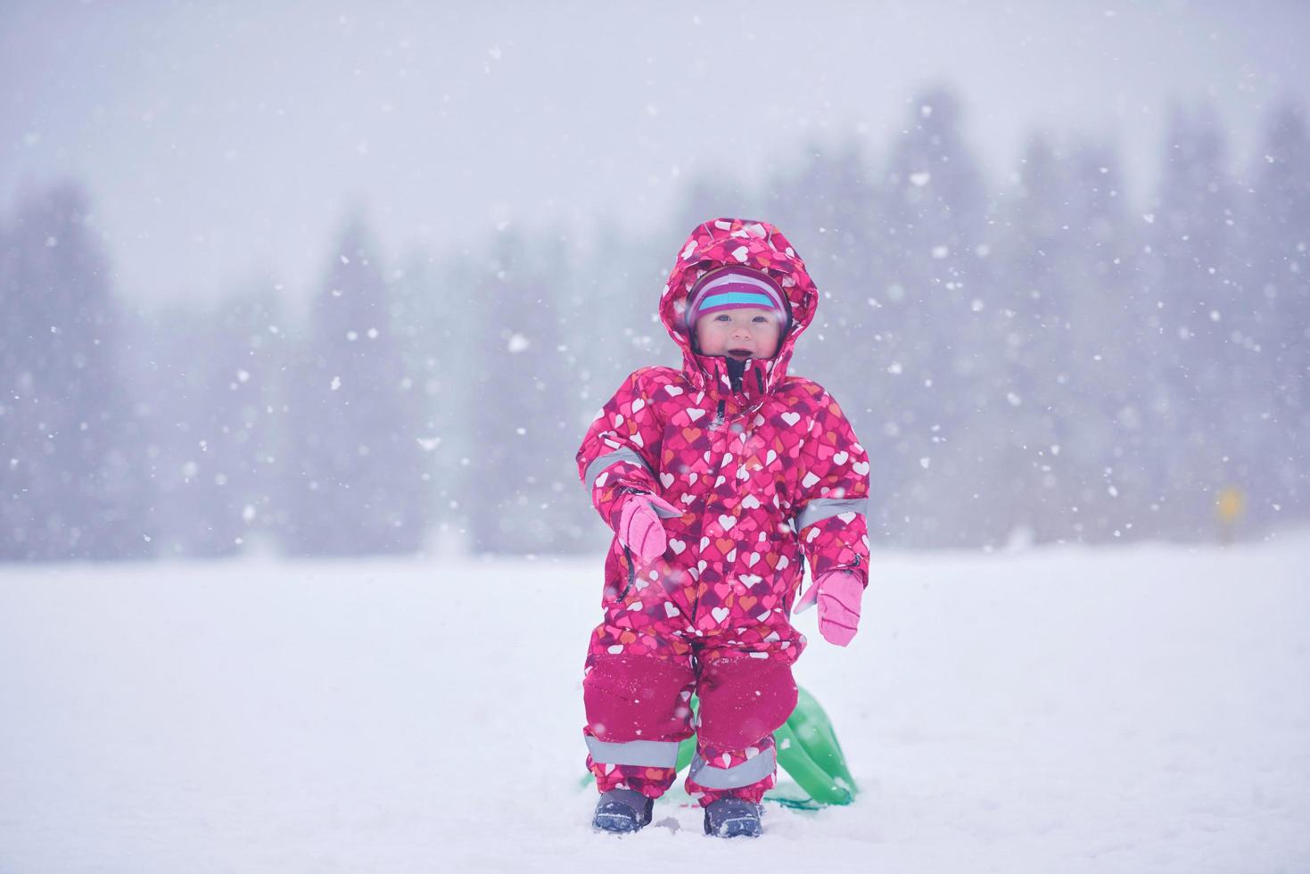 Family in winter landscape photo