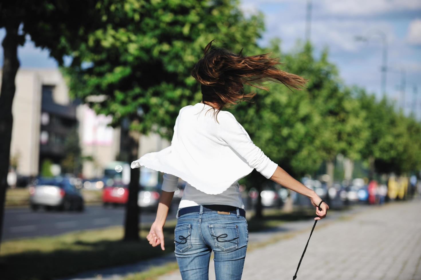 young woman havefun at street photo