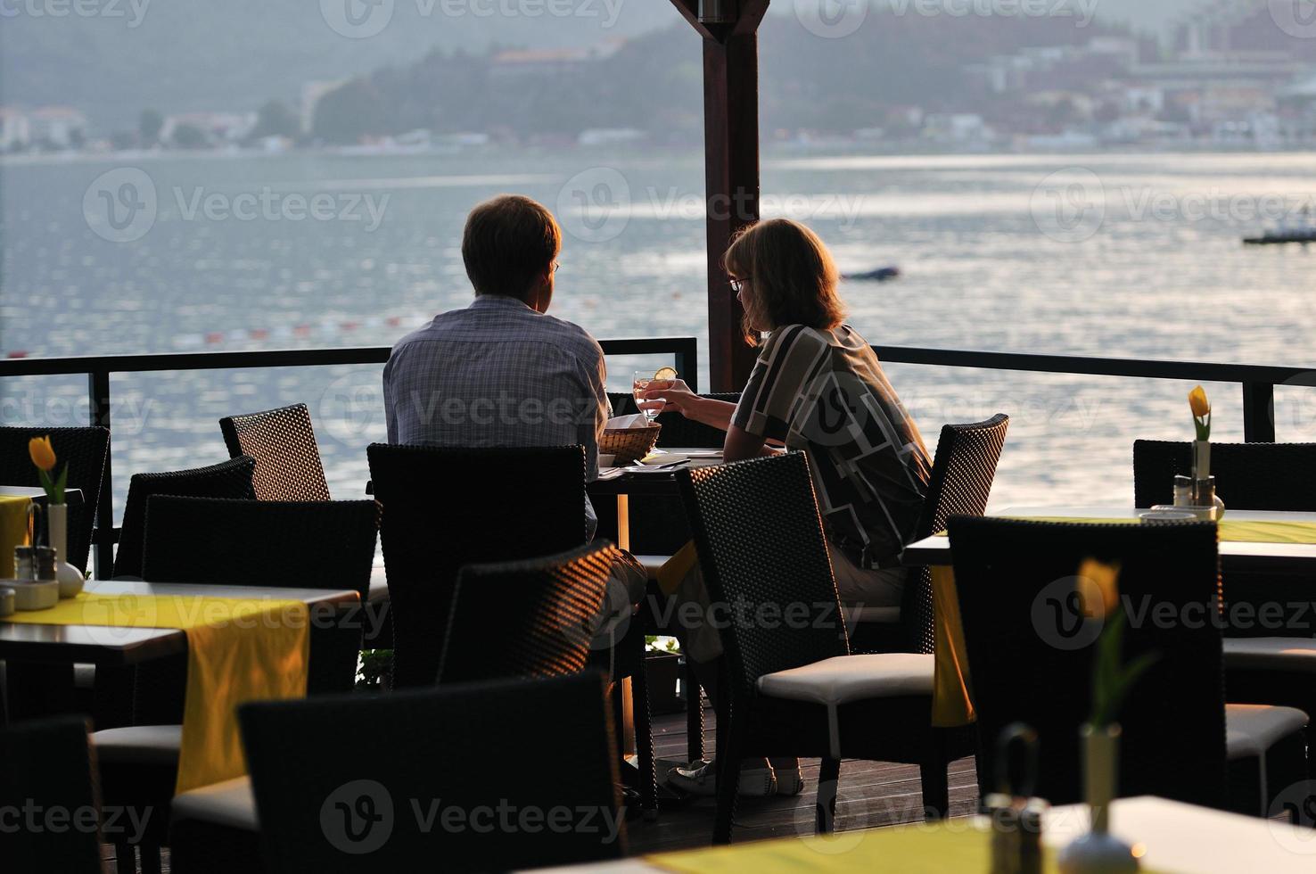 tourists enjoying meal photo