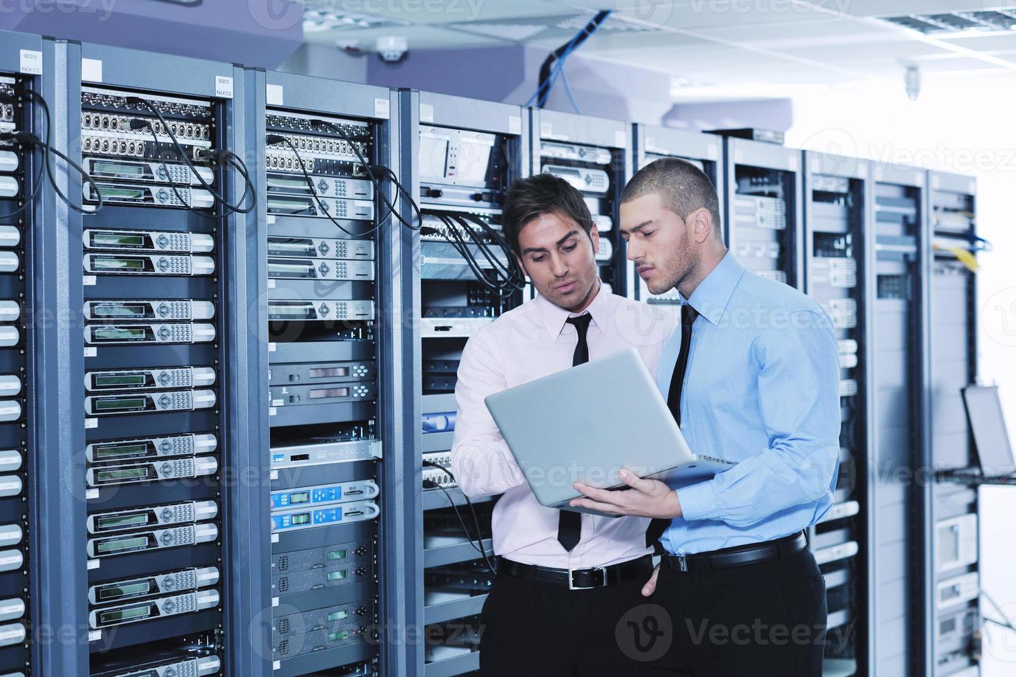 it enineers in network server room photo
