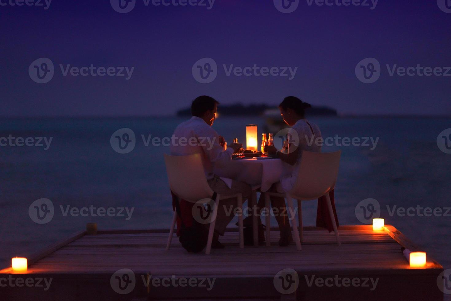 romantic couple have outdoor dinner photo
