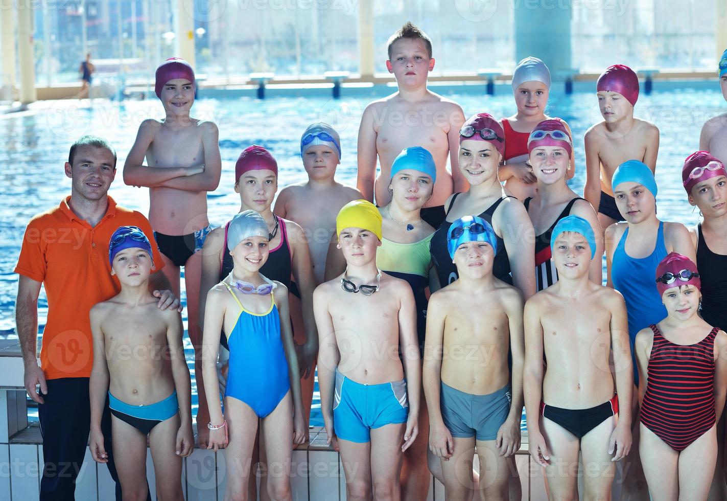 happy children group  at swimming pool photo