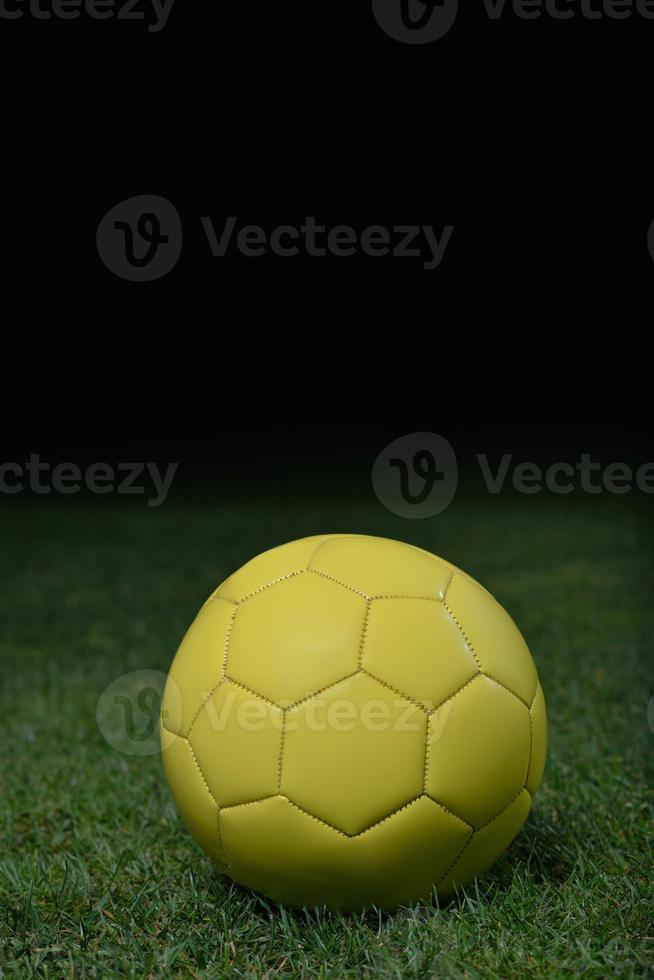 Soccer ball on grass photo