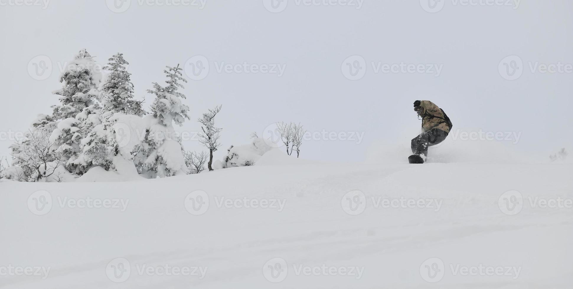 Skier on mountain photo