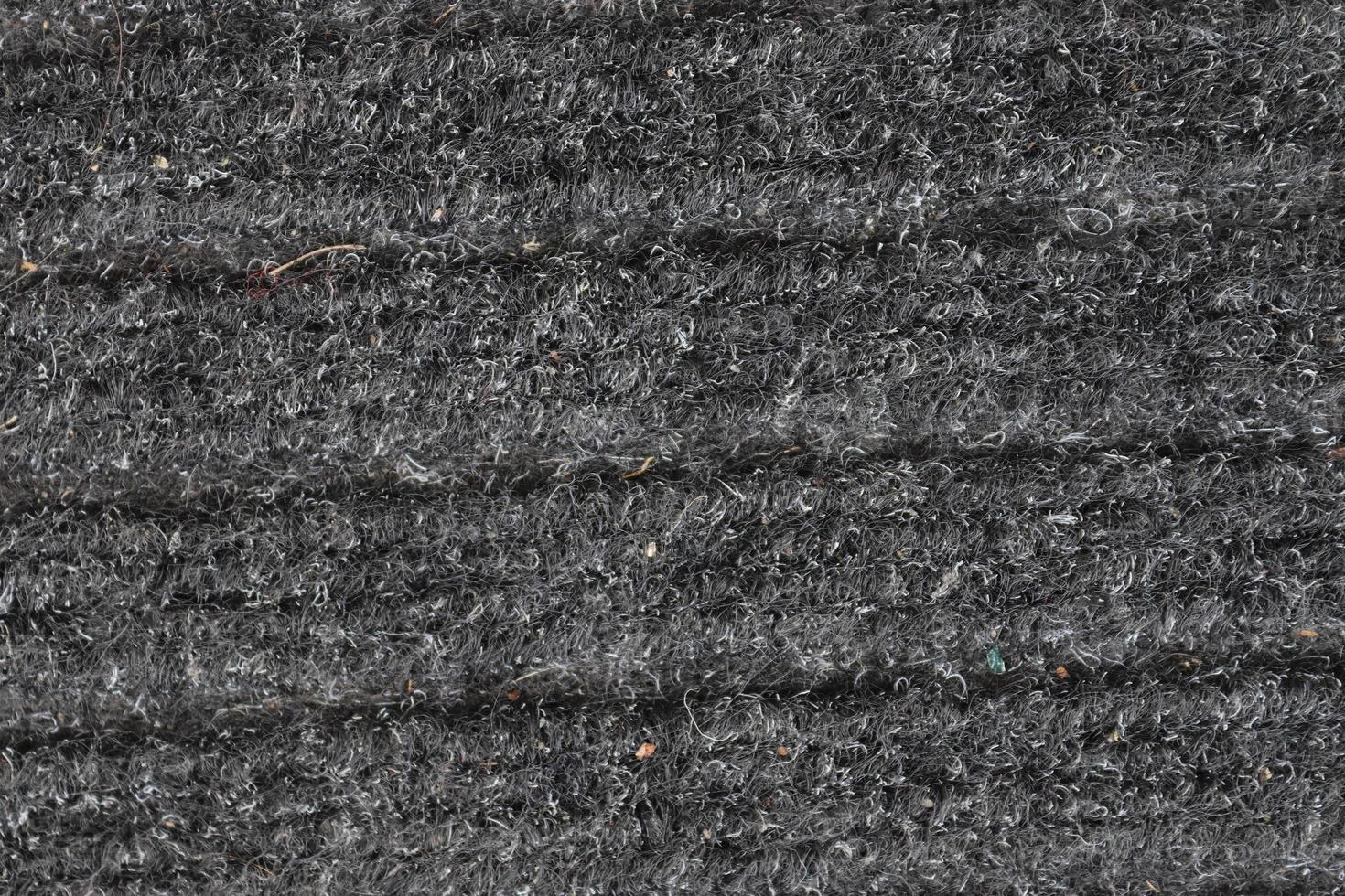 Detailed close up view on samples of cloth and fabrics in different colors found at a fabrics market photo