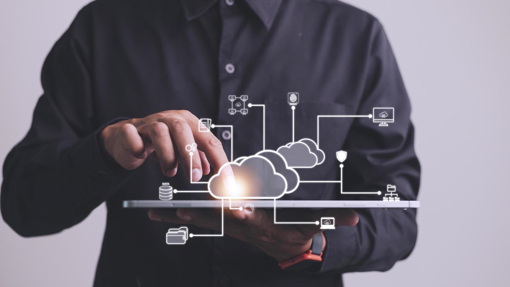Businessman with cloud computing diagram show on hand. Cloud technology. Data storage. Networking and internet service concept. photo