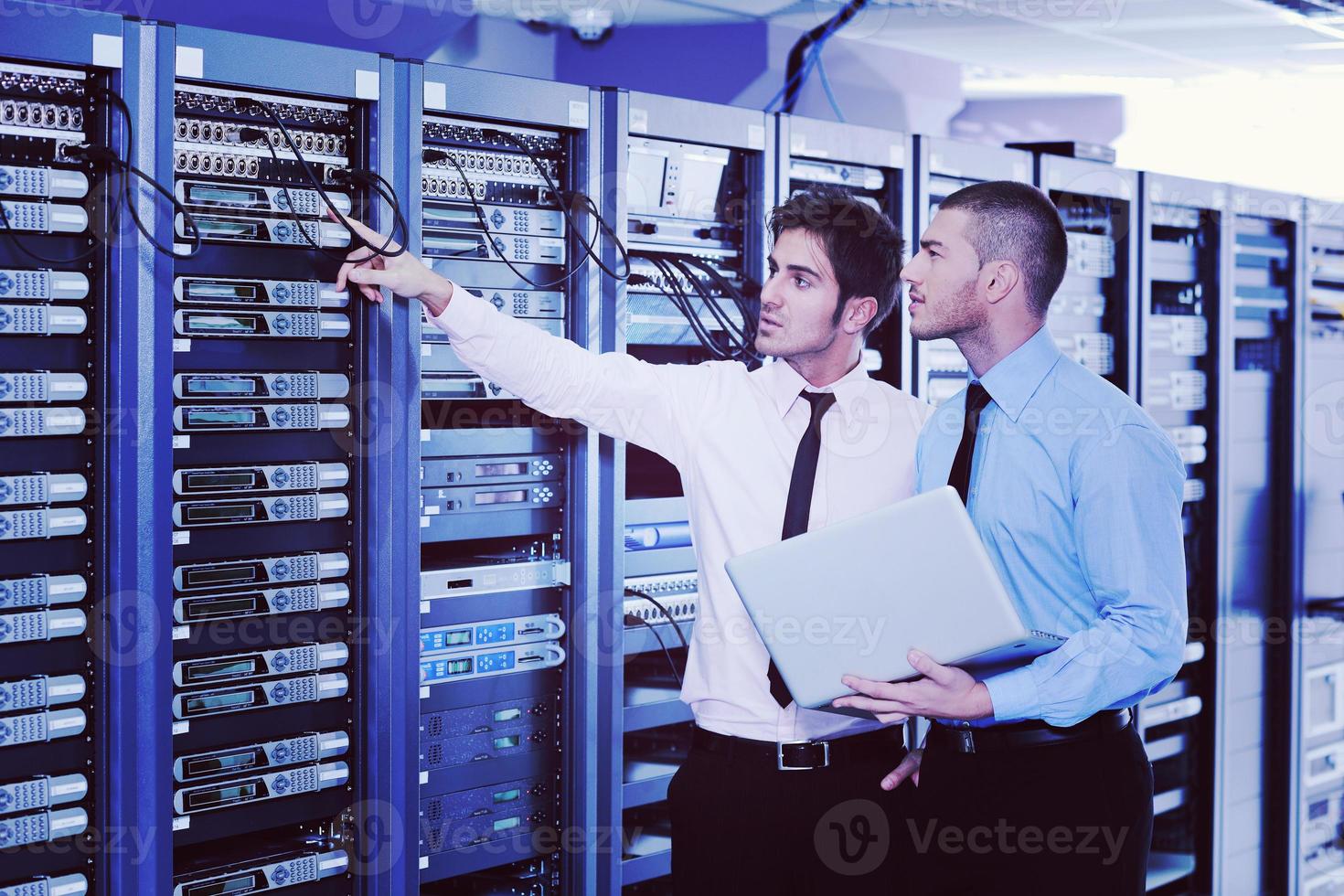 it enineers in network server room photo