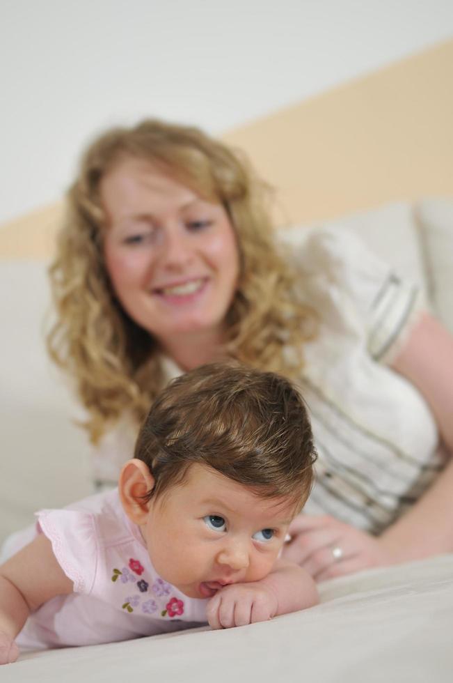 young mother and baby relaxing photo