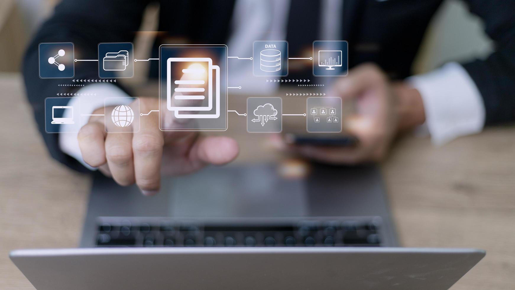 Businessman using a computer to document management concept, online