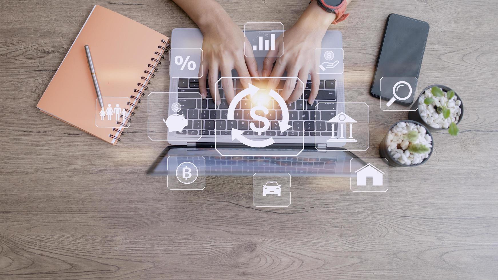 Working woman using a computer to Concept of fund financial investment management portfolio diversification photo