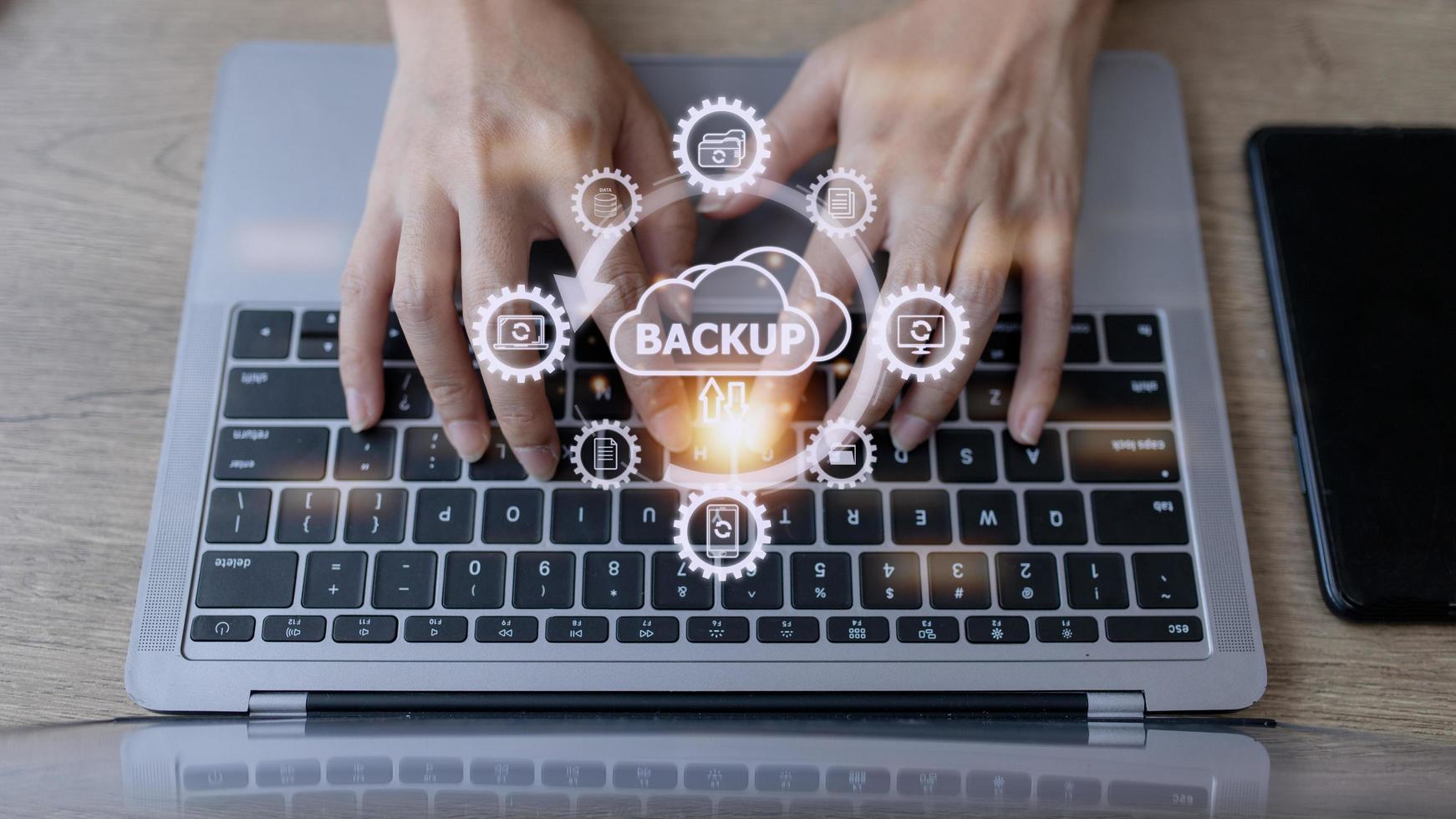 Businesswoman share, backup, download, upload, manage data. Document management concept on smartphones and laptops. Huge online document database photo