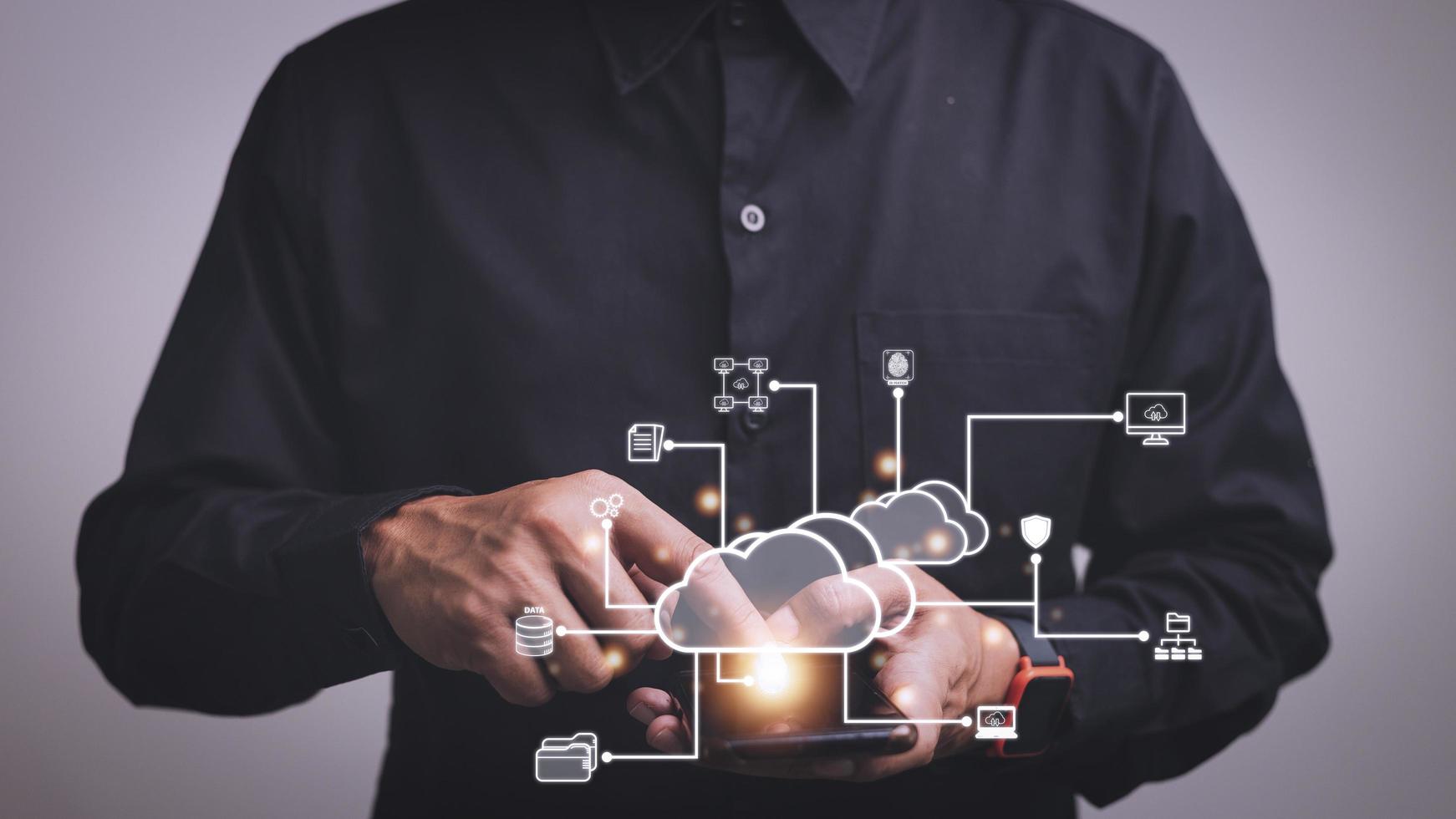 Businessman with cloud computing diagram show on hand. Cloud technology. Data storage. Networking and internet service concept. photo