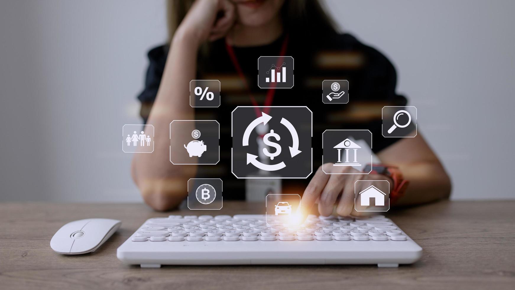 Working woman using a computer to Concept of fund financial investment management portfolio diversification photo