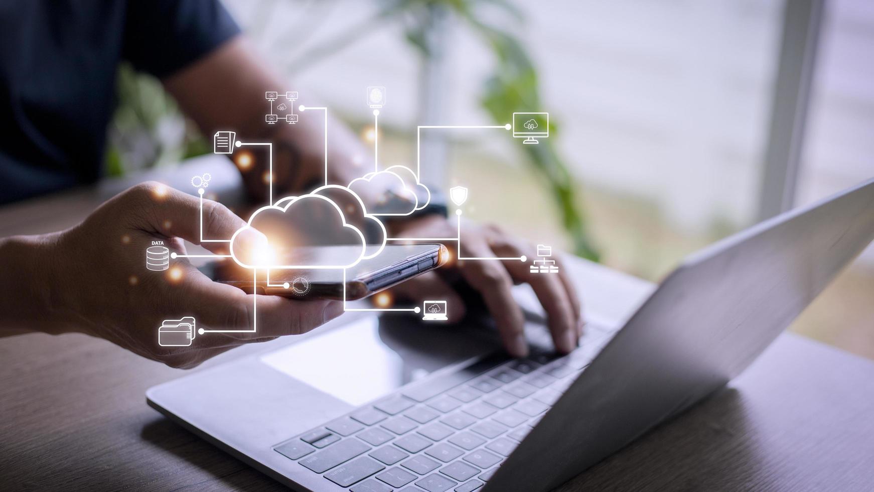 Businessman with cloud computing diagram show on hand. Cloud technology. Data storage. Networking and internet service concept. photo