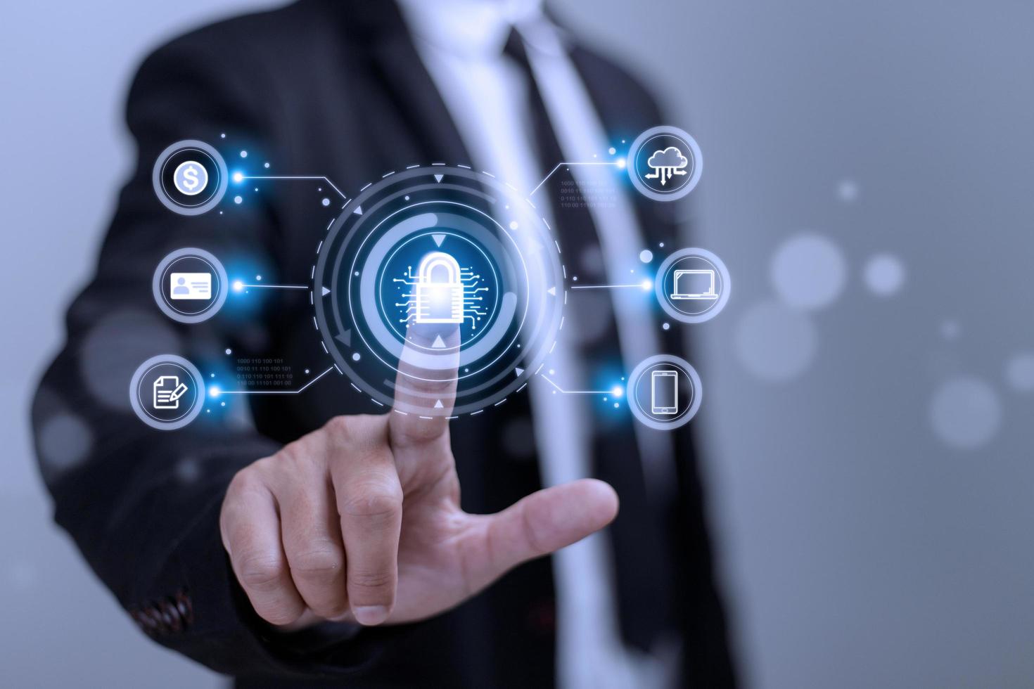 Cybersecurity and privacy concepts to protect data. Lock icon and internet network security technology. Businessman protecting personal data on smart phone with virtual screen interfaces. photo