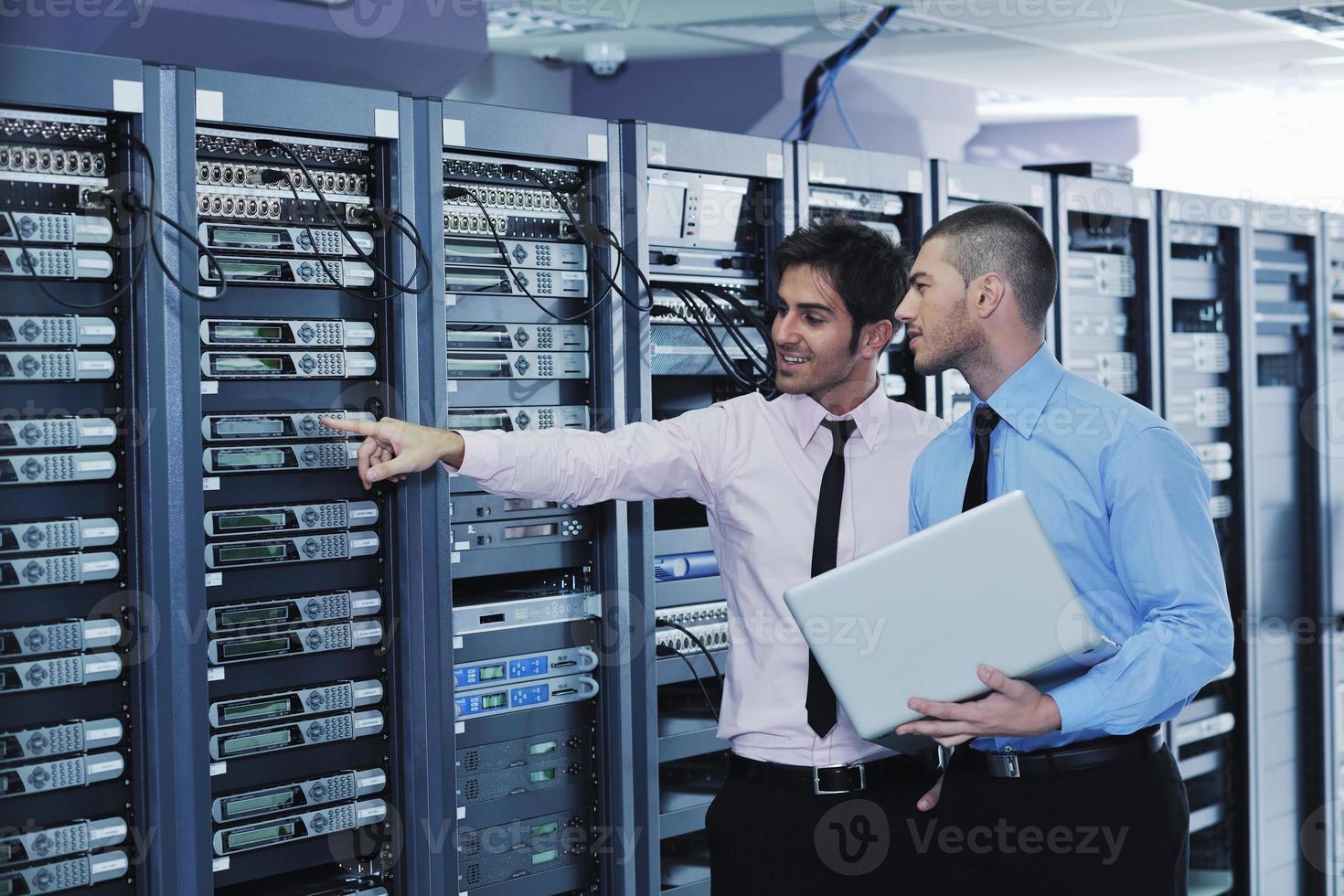 it enineers in network server room photo