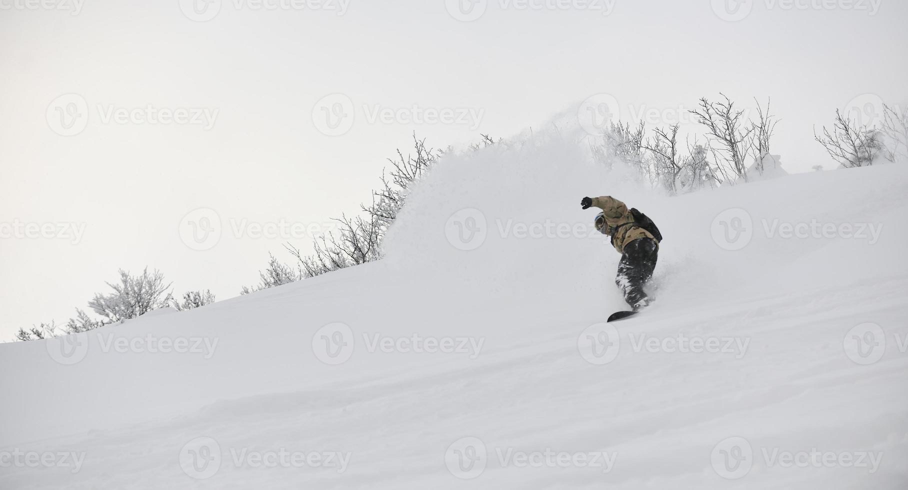 Skiers on mountain photo