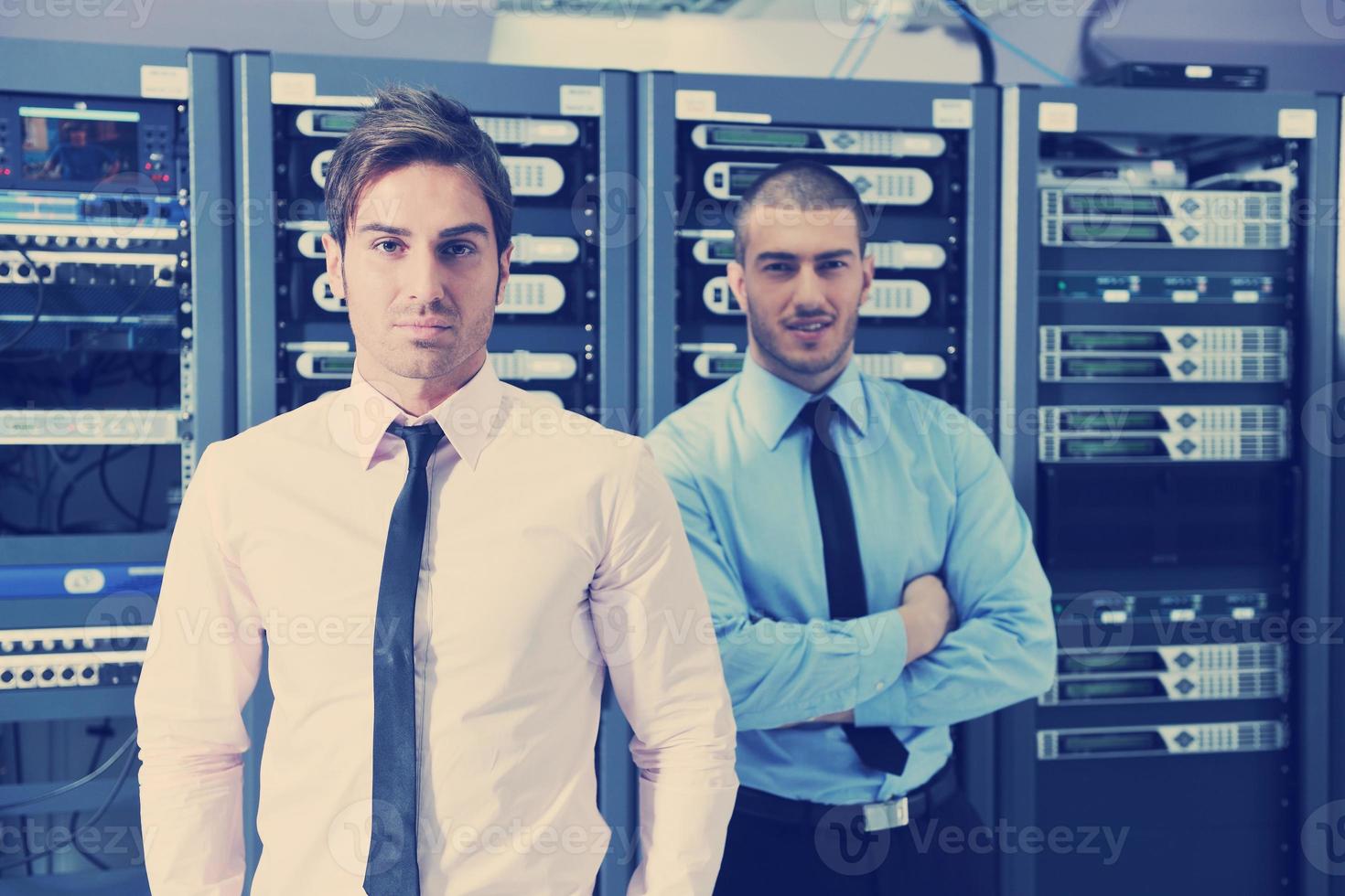 it enineers in network server room photo