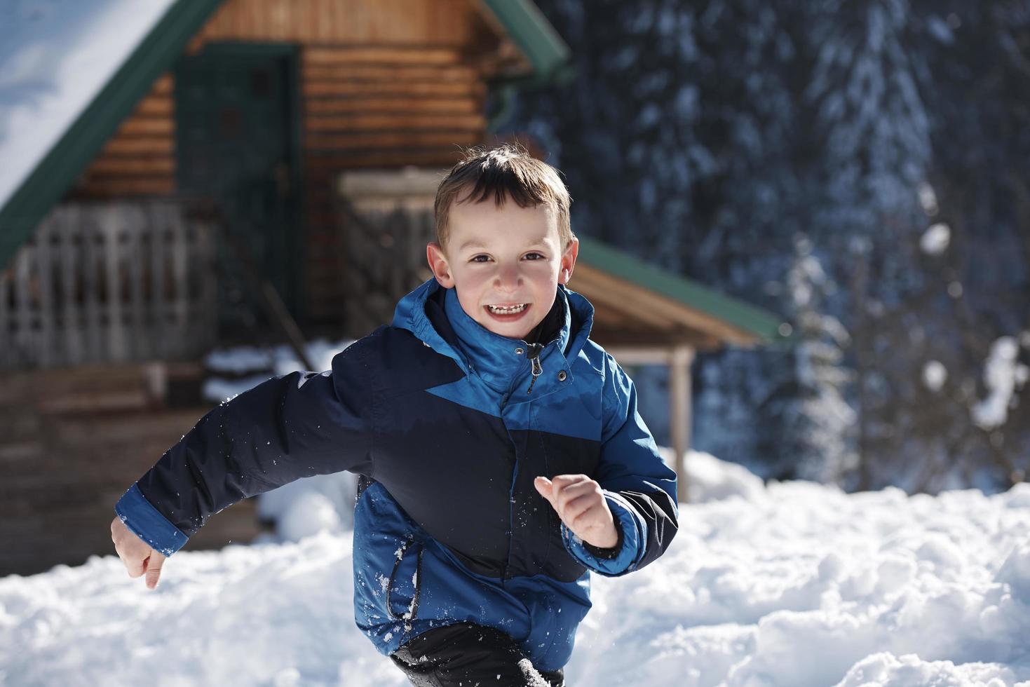 kids playing with  fresh snow photo