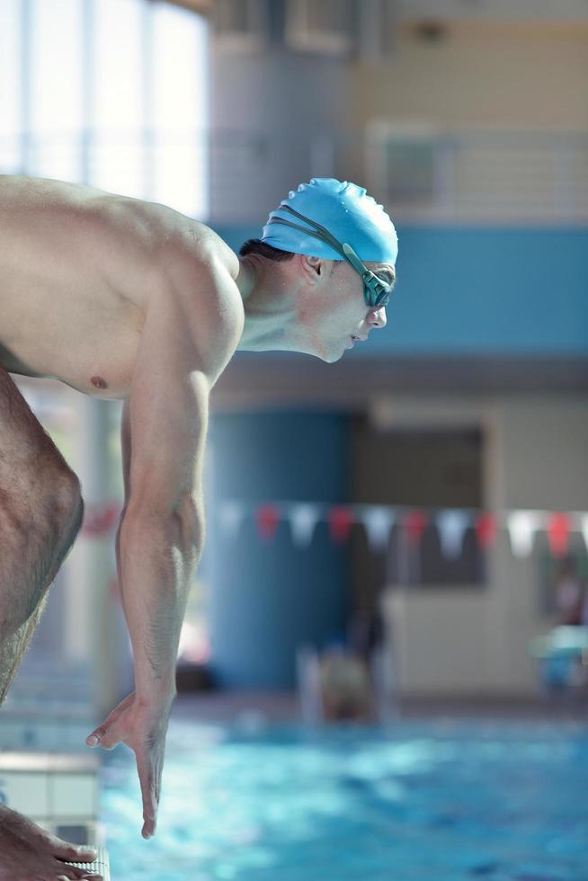 Swimming in indoor pool photo