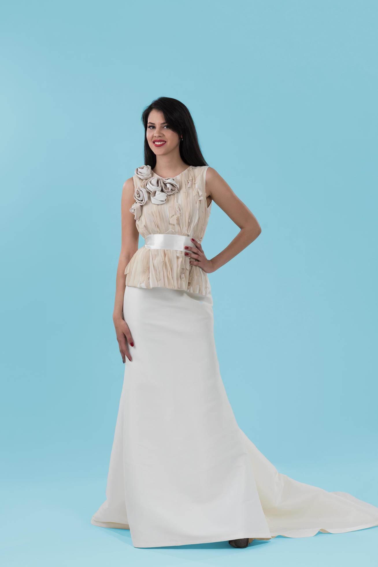 beautiful woman wearing wedding dress against cyan background 11581187