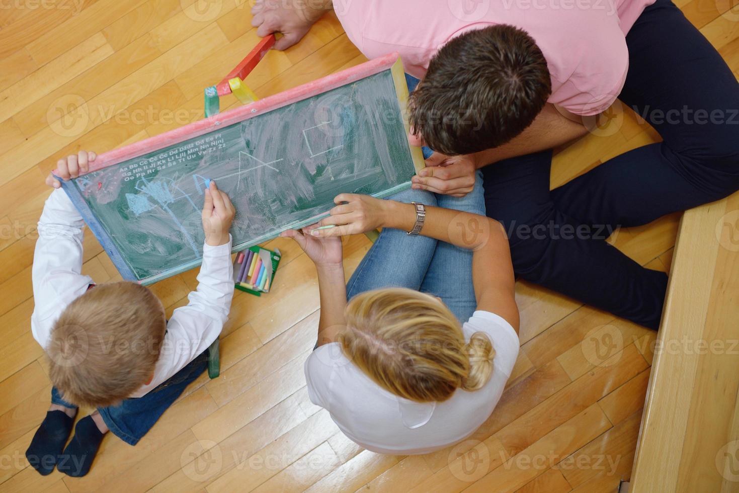 family drawing on school board at home photo