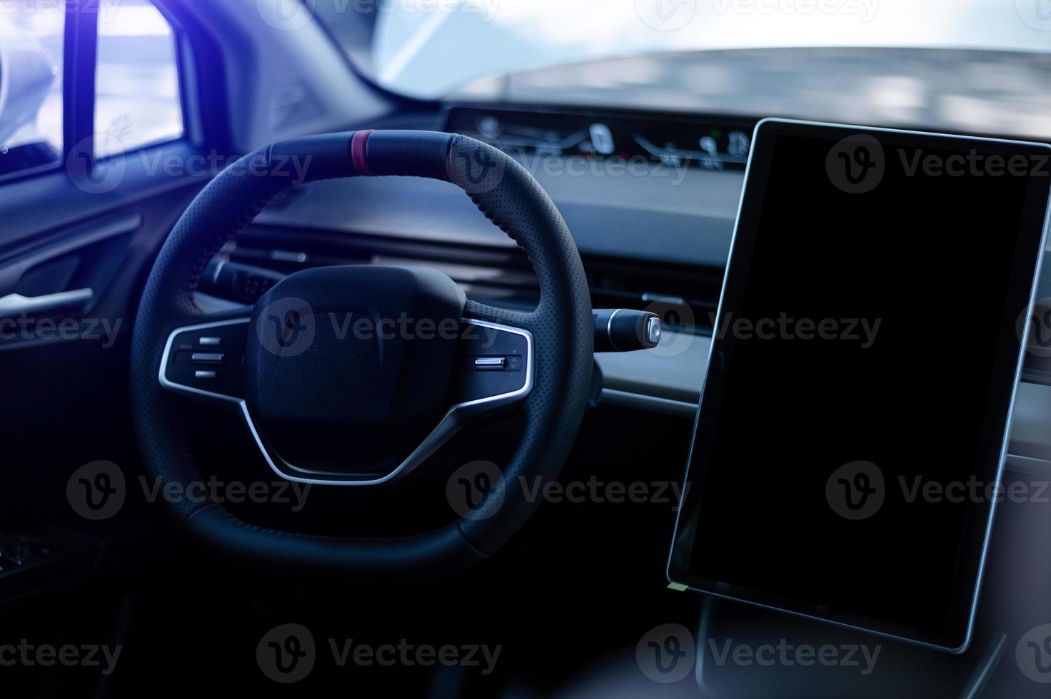 Monitor in EV car with isolated blank screen use for GPS. black screen on white with clipping path. Car display with blank screen. Modern car interior details. photo