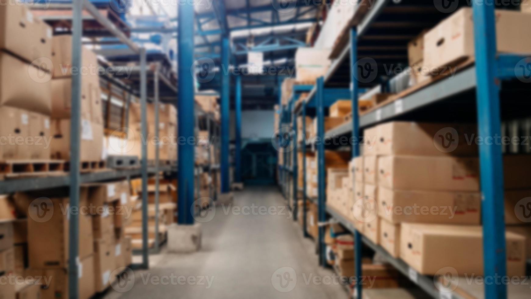 Passageway in a huge distribution warehouse with high shelves. Bottom view. warehouse background concept photo