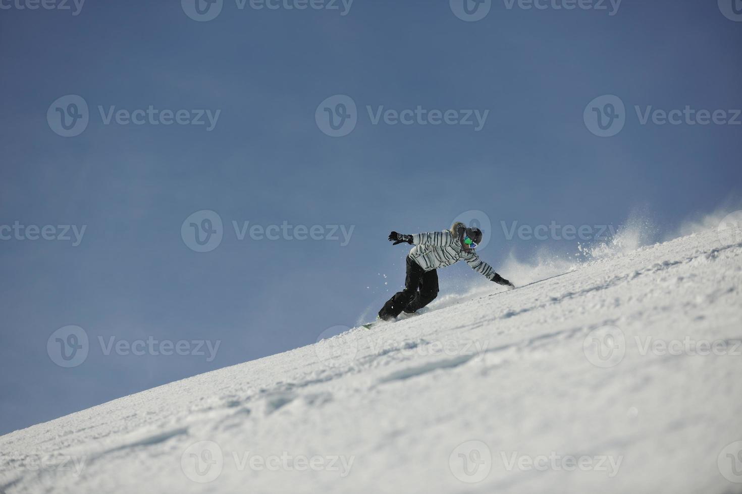 Skiers on mountain photo