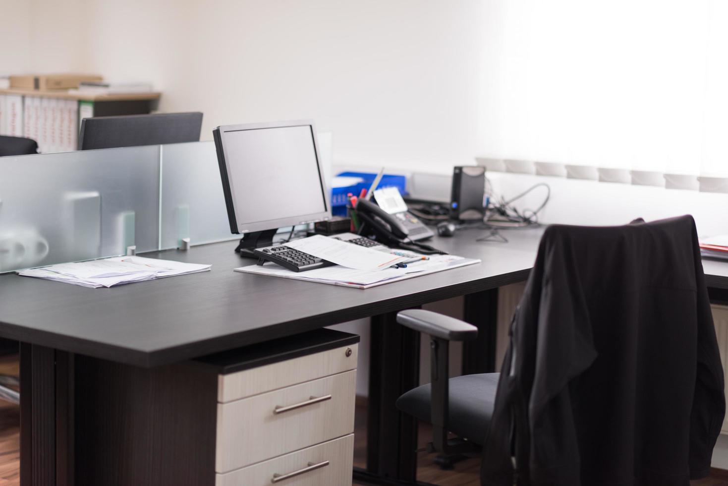 designers in office at the wooden furniture manufacture photo