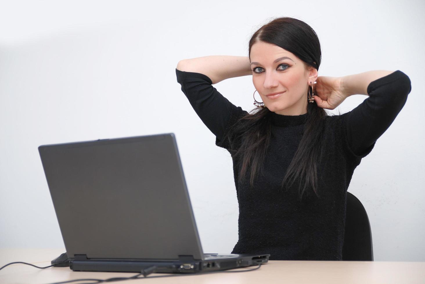 young woman with laptop photo