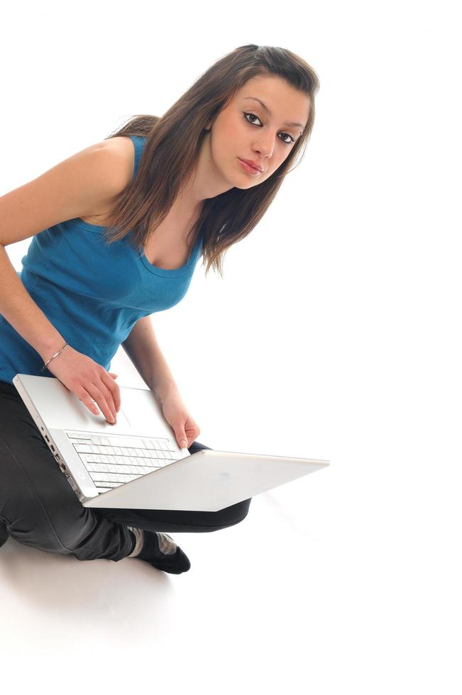 young girl work on laptop photo