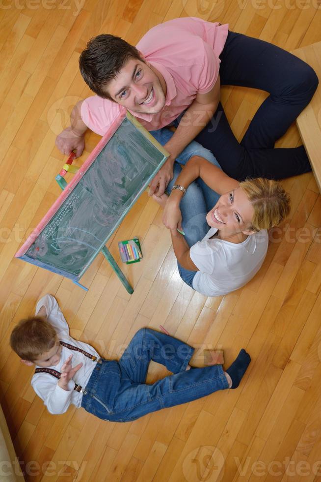 family drawing on school board at home photo