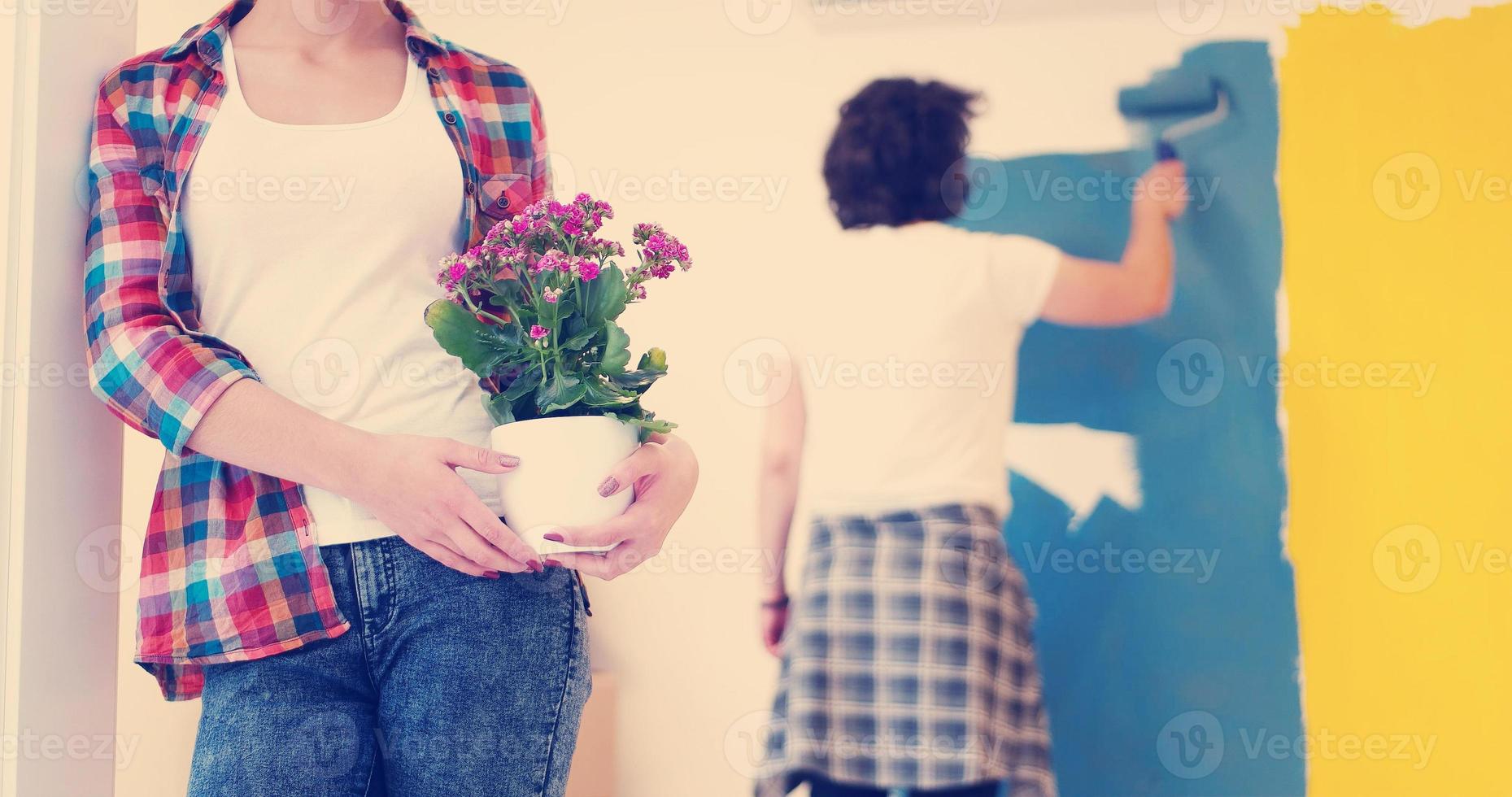 happy young couple doing home renovations photo