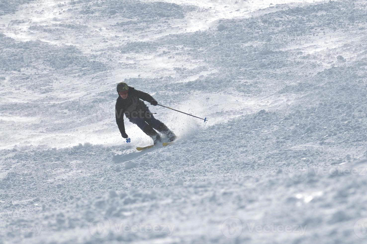 Skiers on mountain photo