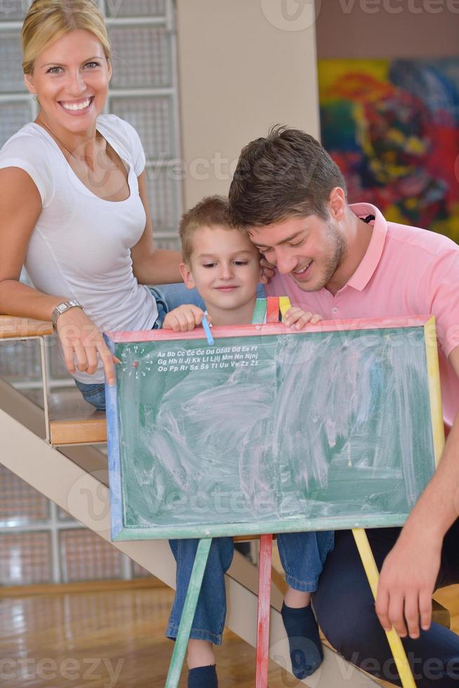 family drawing on school board at home photo