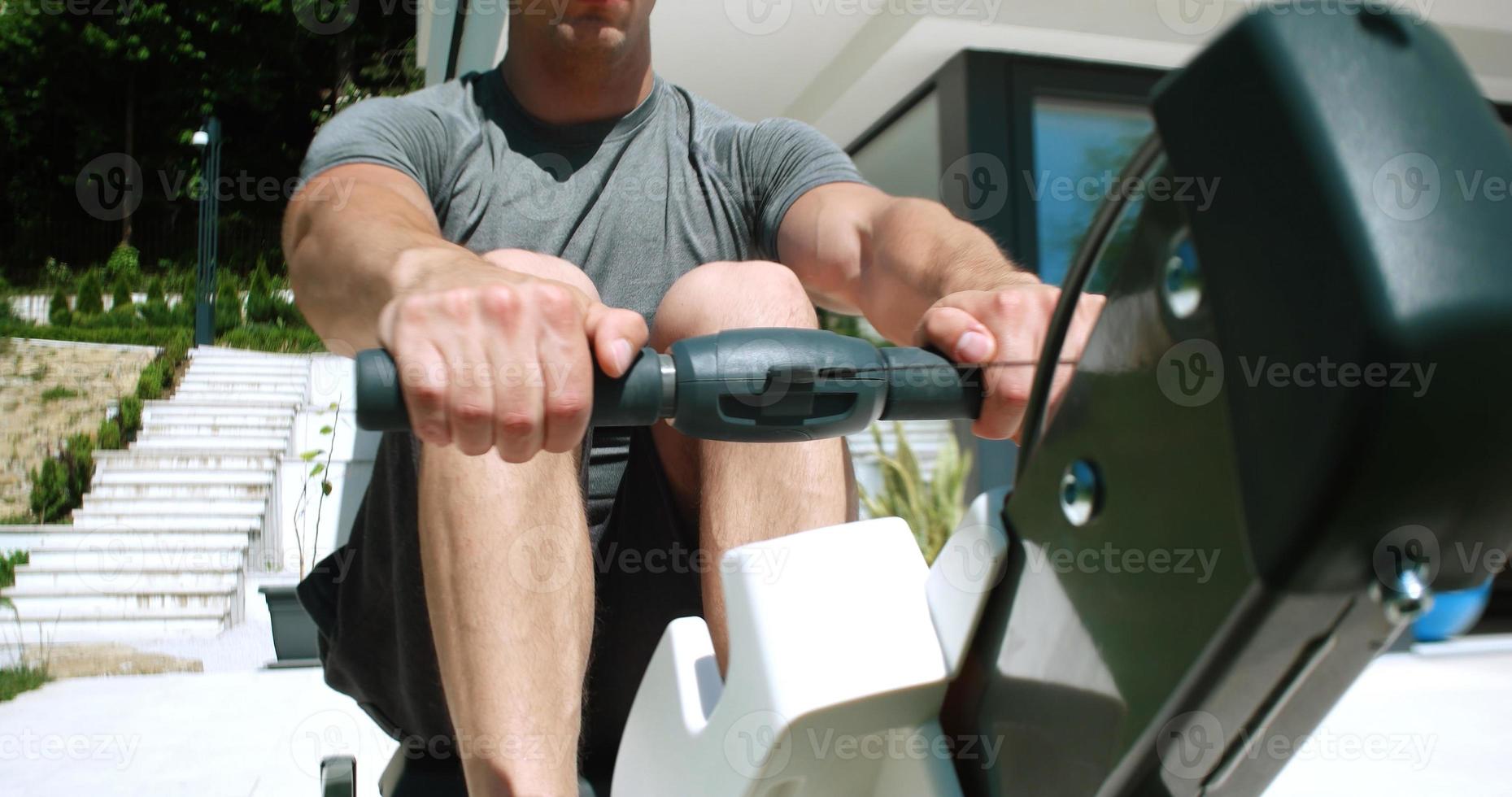 Rowing Machine on terrace of beautiful villa photo