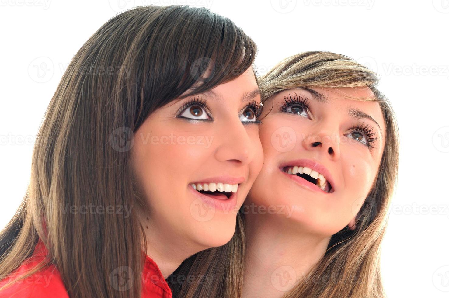 two young girls isolated on white photo