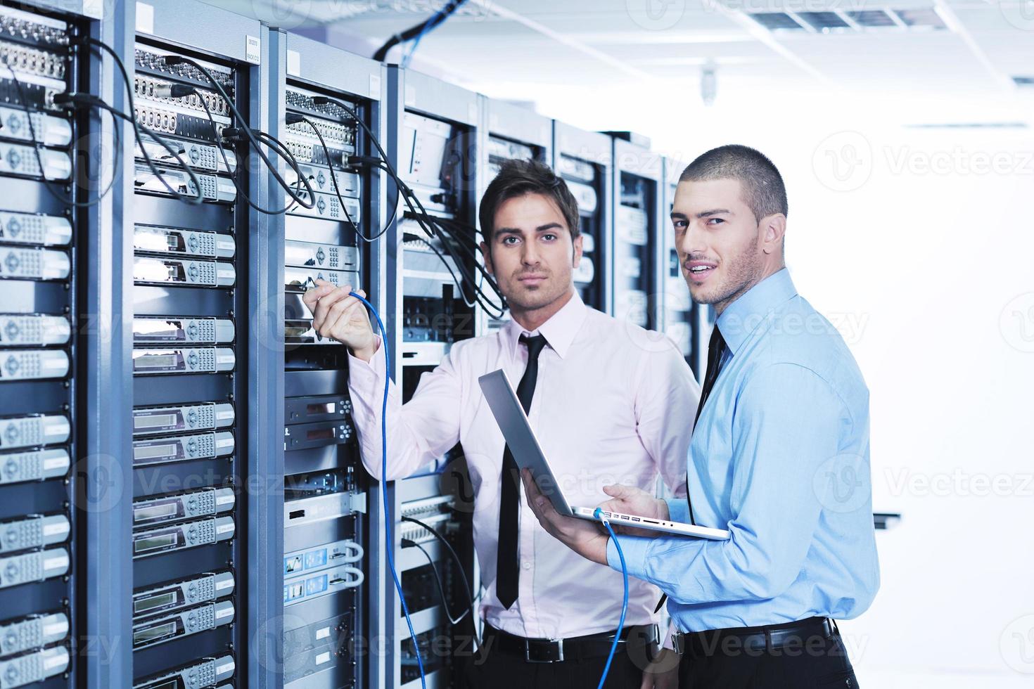 it enineers in network server room photo