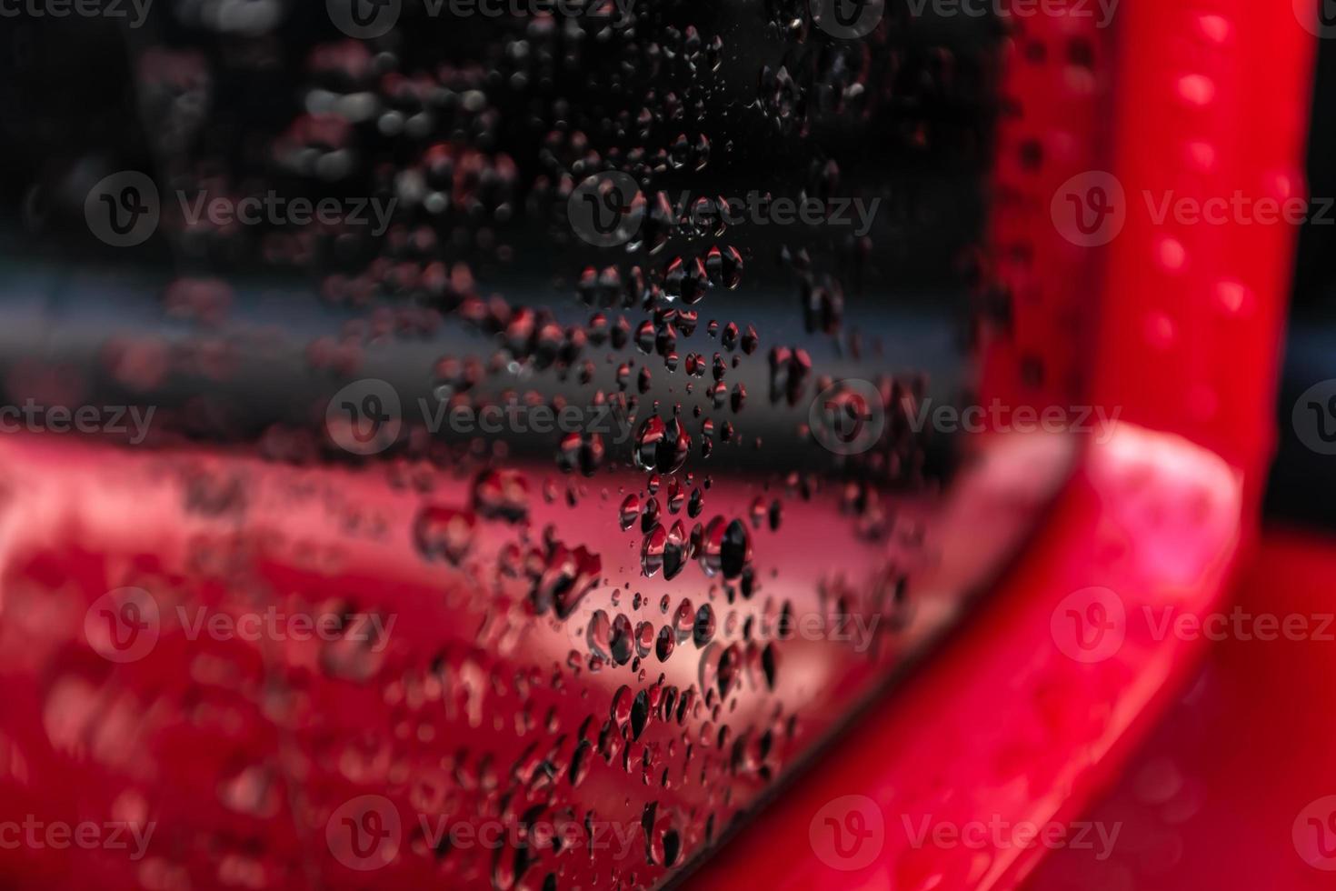 Water drops on the car mirror photo