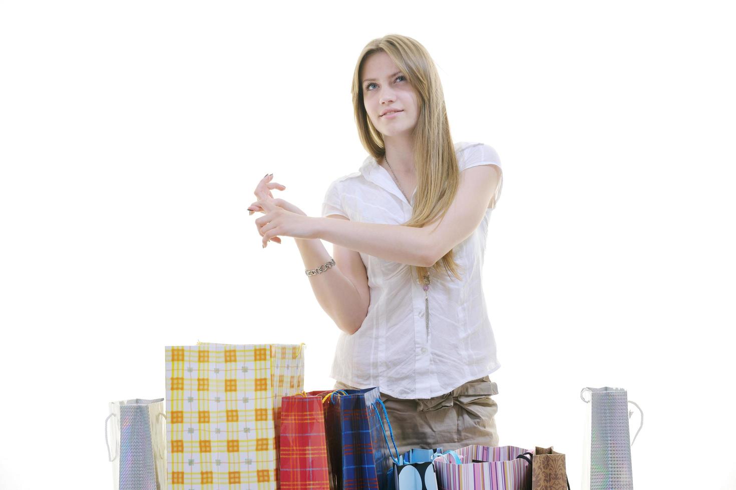 happy young adult women  shopping with colored bags photo