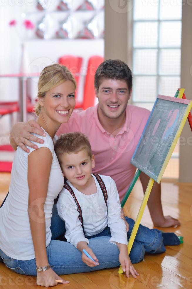family drawing on school board at home photo