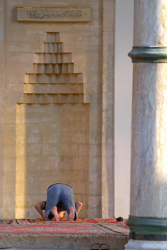 Bosnia, 2022 - Man praying in mosque photo