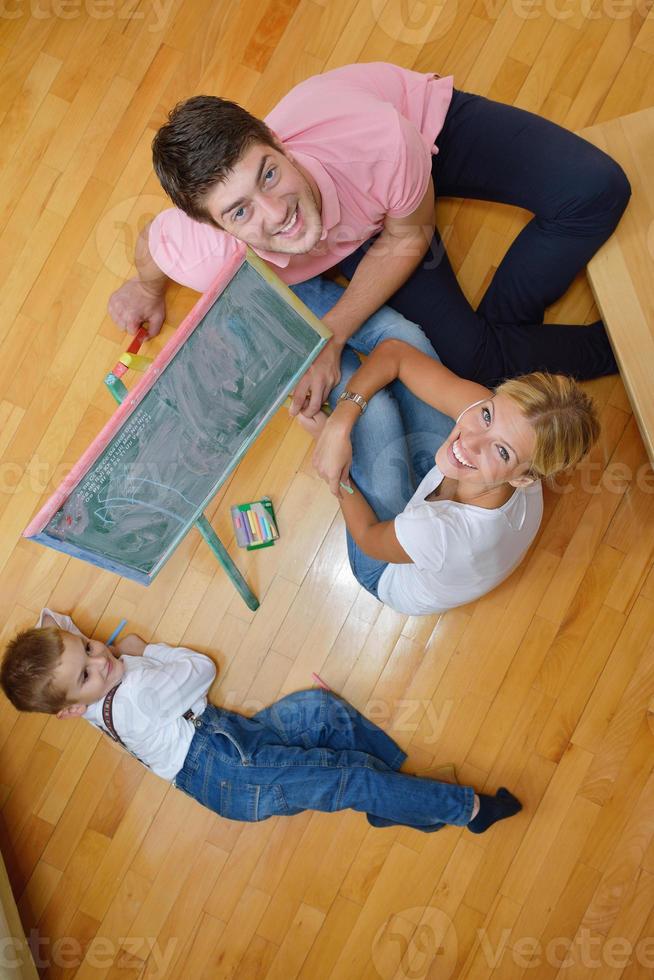 family drawing on school board at home photo