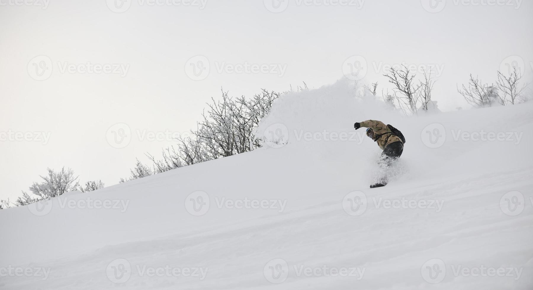 Skiers on mountain photo