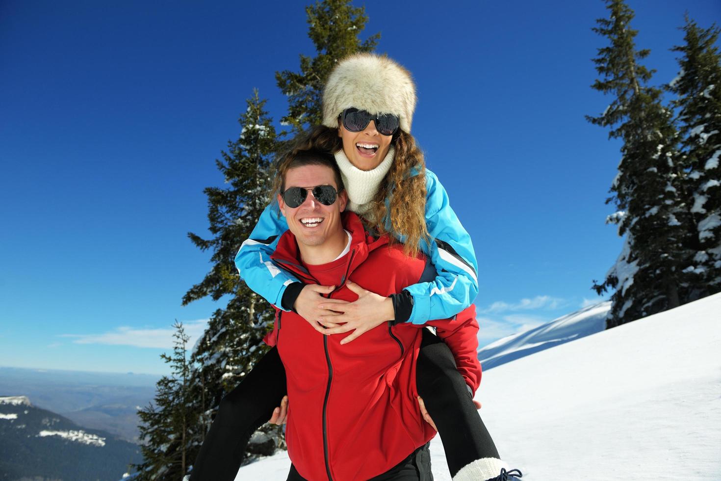 Young Couple In Winter  Snow Scene photo