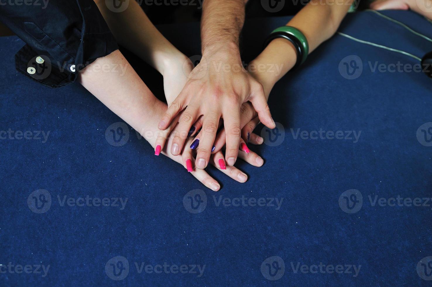 Hands on blue surface photo