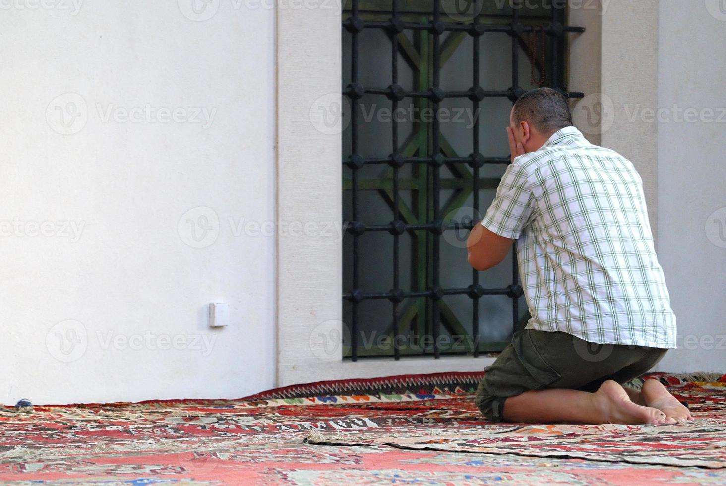 Man praying outside photo
