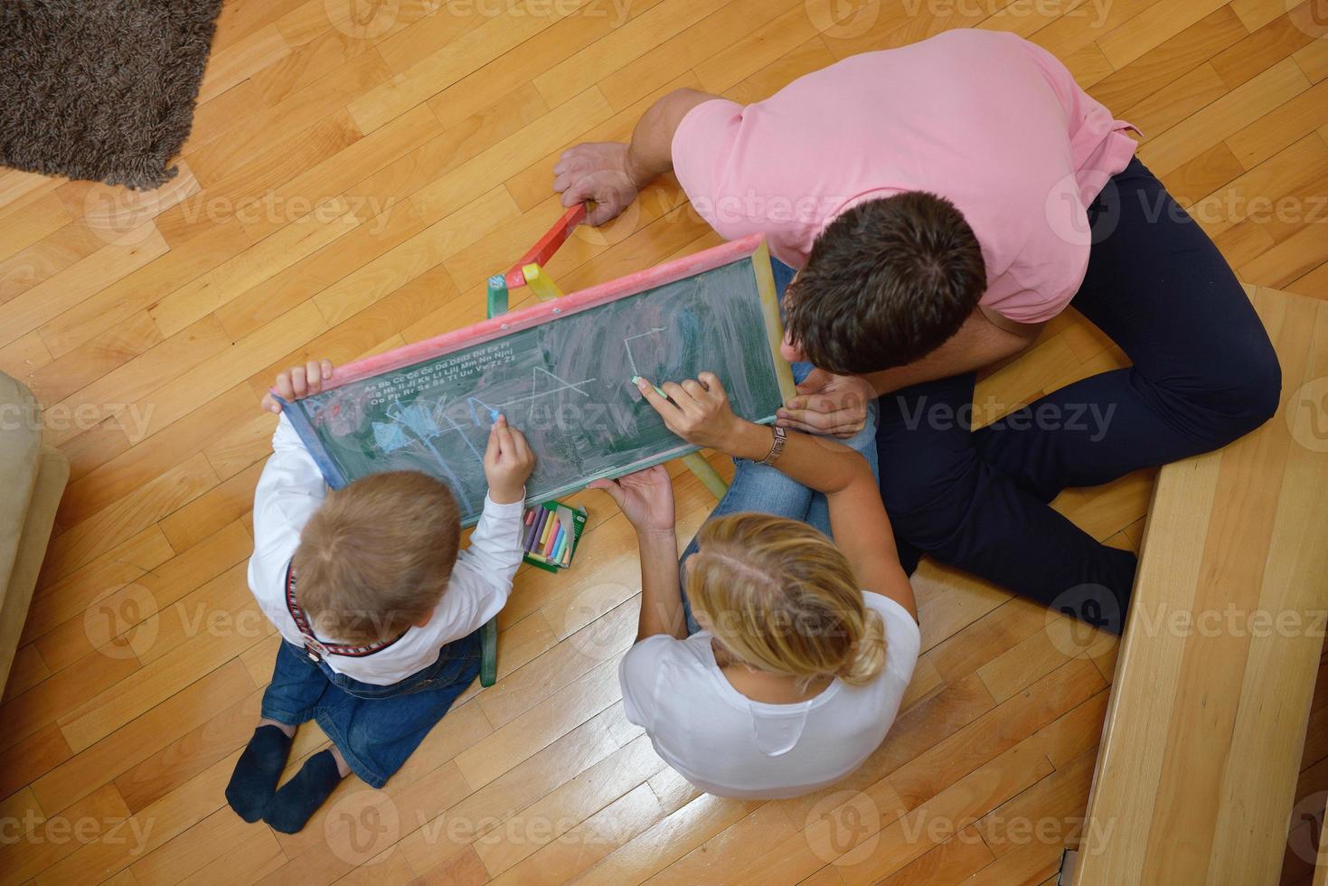 family drawing on school board at home photo
