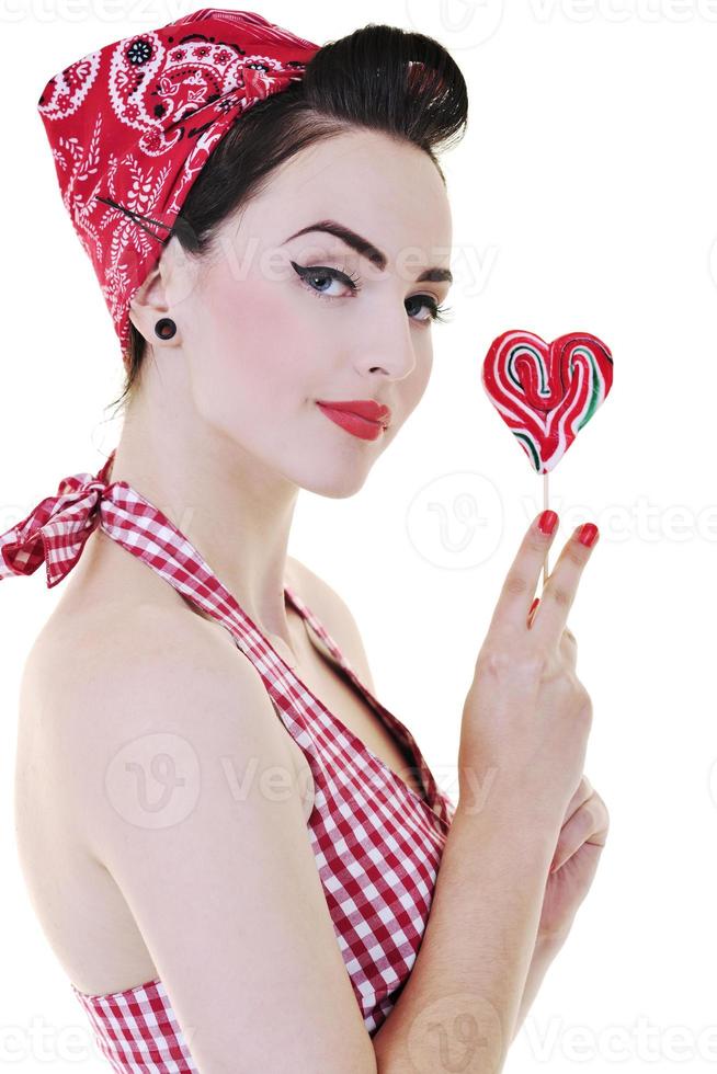 mujer feliz con piruleta aislado en blanco foto